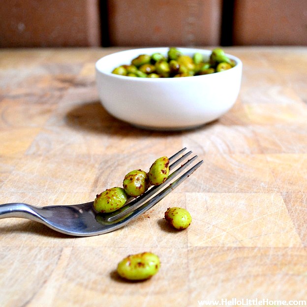 Easy Edamame snack made with frozen edamame, chili powder, and salt.