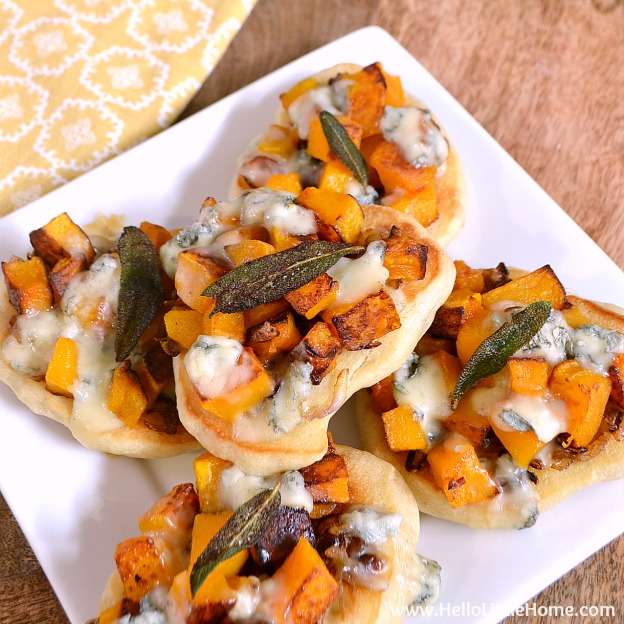 Mini Roasted Butternut Squash and Gorgonzola Pizzas ... Get this easy recipe + 100 other vegetarian winter recipes that are perfect for any occassion! | Hello Little Home