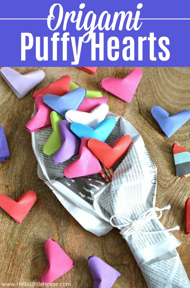 A bouquet of Origami Puffy Hearts on a wood table.