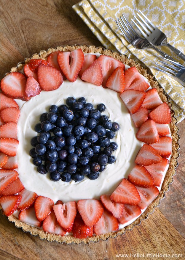 You are going to love this No Bake Red, White, and Blue Cheesecake Tart! Get this easy recipe + over 60 more vegetarian summer recipes that are perfect for any occassion! | Hello Little Home