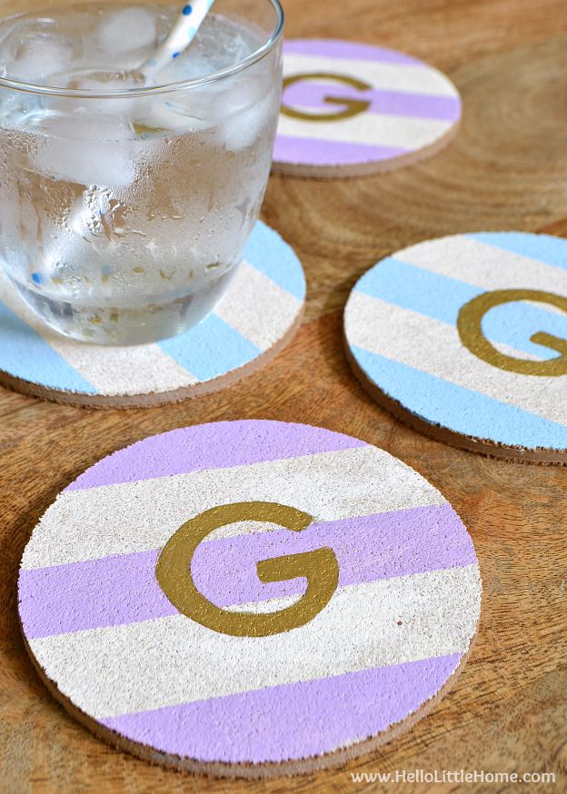 These DIY Monogram Coasters with Stripes are the perfect coffee table accessory, plus they make a great gift! | Hello Little Home