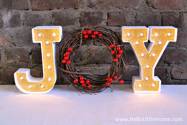Learn how to make a gorgeous Lighted Holiday Marquee Sign ... it's a super easy and festive DIY Christmas decor craft! | Hello Little Home