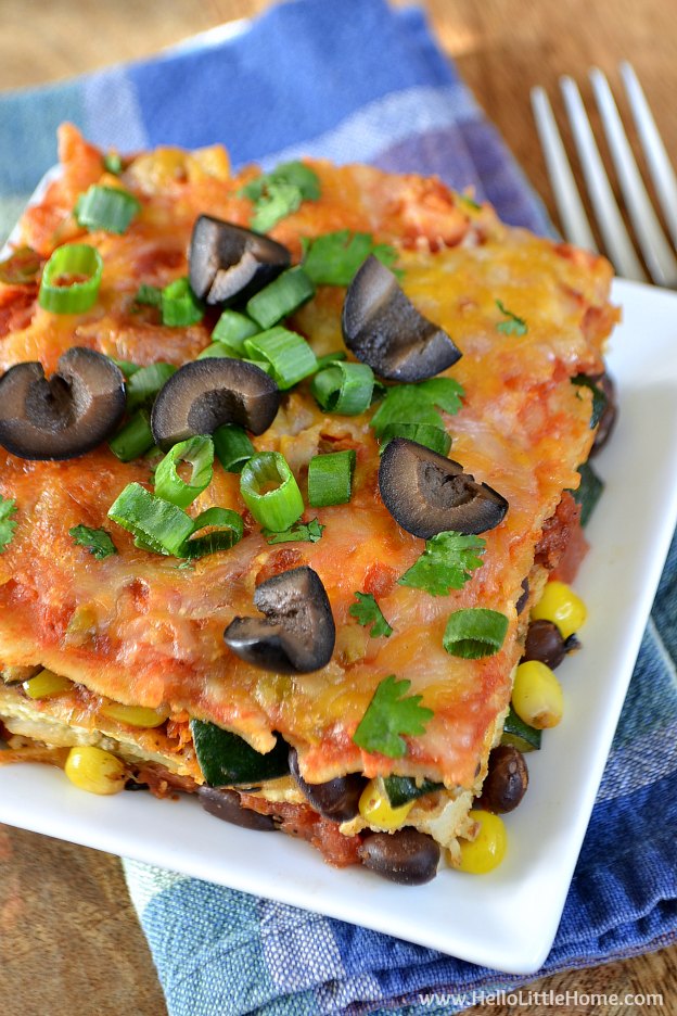 Easy Mexican Lasagna ... one of 100 Vegetarian Game Day Recipes! Get ready for the big game with over 100 vegetarian and vegan appetizers, soups, chilis, main dishes, sandwiches, breakfast, desserts, and more that will make your next football watching party unforgettable! | Hello Little Home