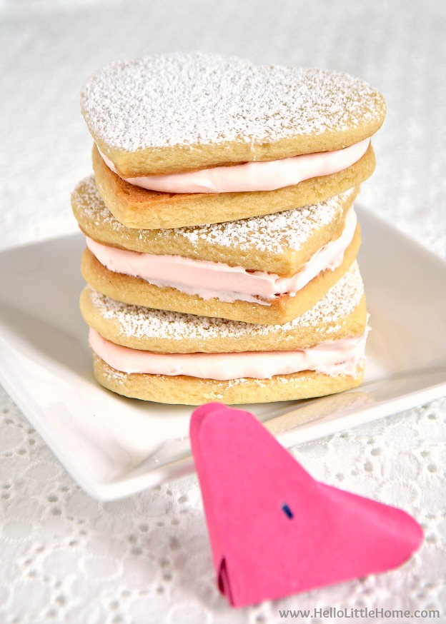 Heart Sandwich Cookies with White Chocolate Cream Cheese Filling ... the perfect Valentine's Day recipe! Learn how to make this adorable heart shaped dessert with a fun and easy recipe! | Hello Little Home