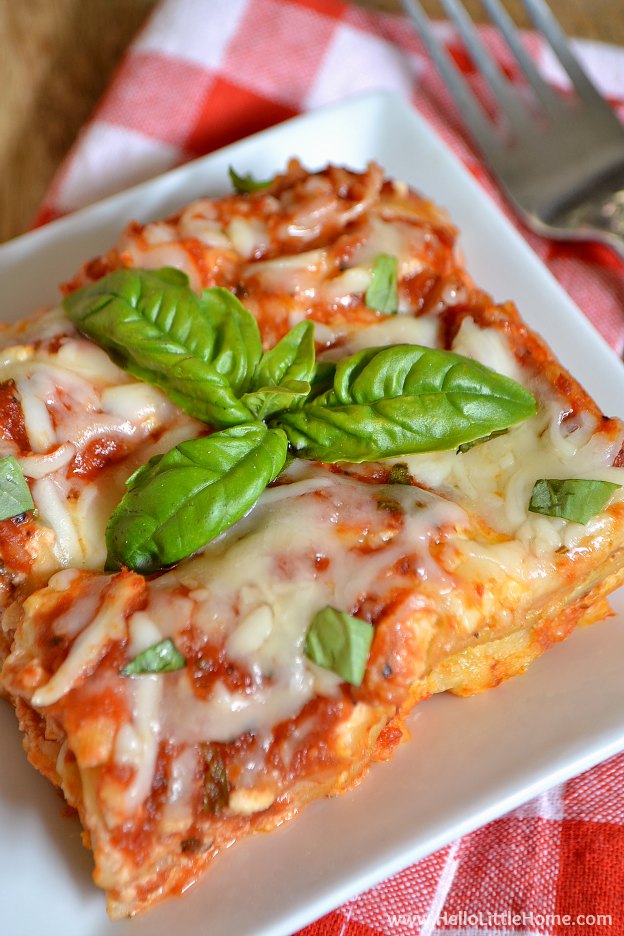 Four Cheese Tomato Basil Crockpot Lasagna ... Get this easy recipe + 100 other vegetarian winter recipes that are perfect for any occassion! | Hello Little Home