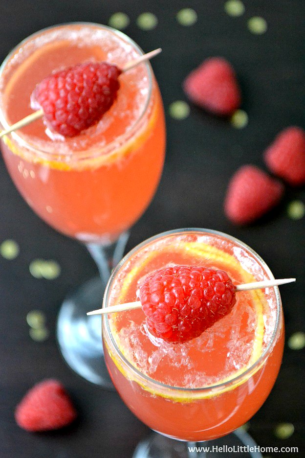 An overhead view of two Raspberry French 75s.