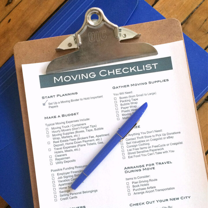 A printable moving checklist on a clipboard.