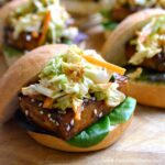 You are going to love these Korean BBQ Tofu Sliders with Kimchi Slaw! Get this easy recipe + over 60 more vegetarian summer recipes that are perfect for any occassion! | Hello Little Home