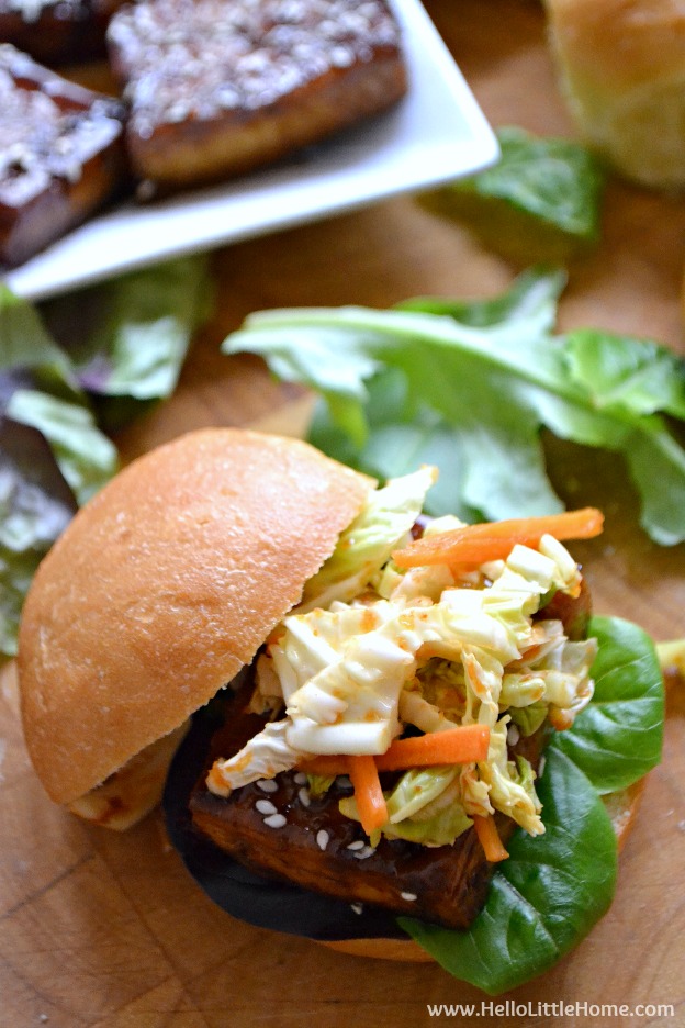 Korean BBQ Tofu Sliders with Kimchi Slaw ... one of the BEST things you'll ever eat! Seriously, these sweet and spicy vegetarian sliders are full of delicious Korean flavors, yet they're simple to make with easy to find ingredients. Perfect for a summer barbeque, party, or other get together! | Hello Little Home