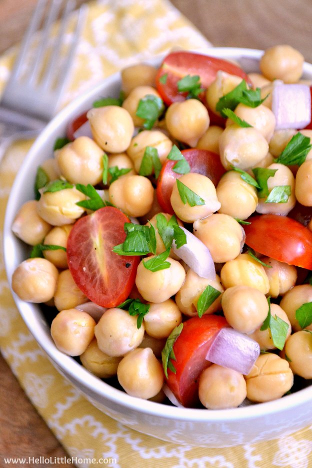 Lemony Chickpea Salad recipe ... a quick, easy vegan side dish that's a wonderful addition to any meal! This simple chickpea salad is bursting with fresh, healthy flavors! Perfect for all your summer BBQs and picnics, and makes a great light meal, too! | Hello Little Home