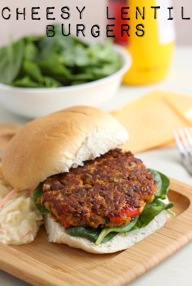 Cheesy Lentil Burgers from Amuse Your Bouche ... one of 20 Mouthwatering Veggie Burger Recipes ... perfect for all your summer cookouts and parties! These delicious vegetarian and vegan burgers are filled with healthy ingredients + super delicious ... make one for your next BBQ! | Hello Little Home
