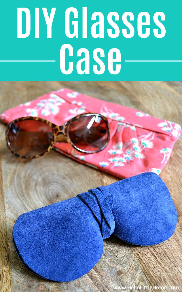 The DIY glasses cases on a wood table with a clutch bag and pair of sunglasses behind it.