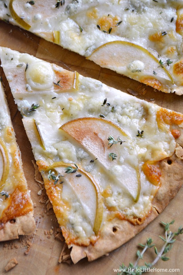 Easy Gorgonzola Pear Pizza ... so delicious and so simple to make! This easy vegetarian recipe is a quick + delish weeknight dinner solution, and it's perfect for parties, too! | Hello Little Home