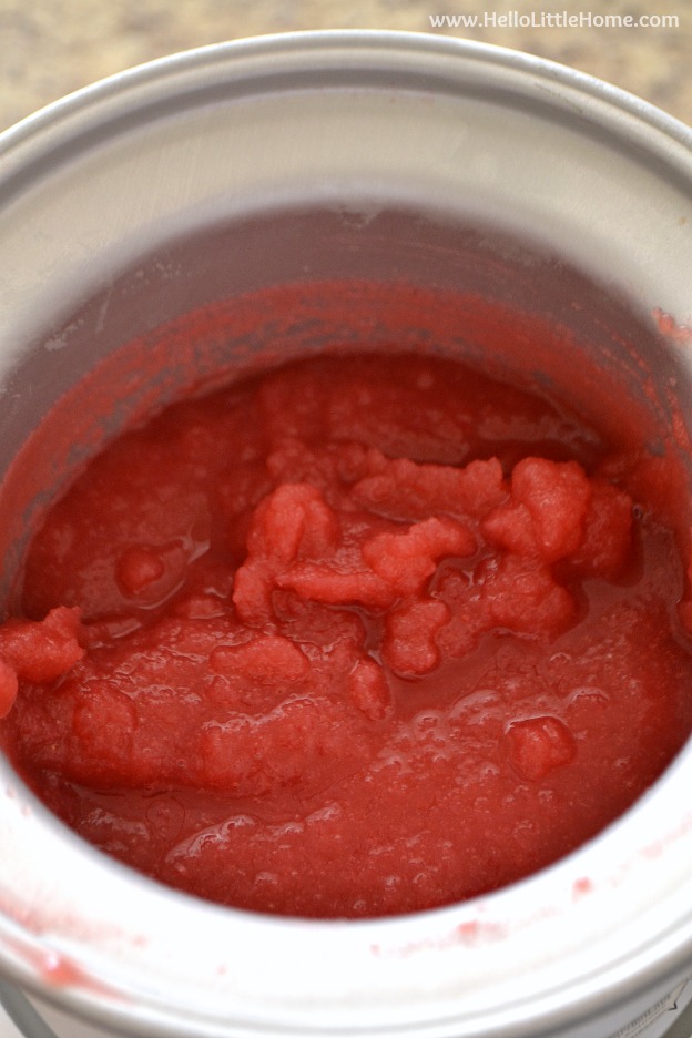 Frose mixture in an ice cream maker.