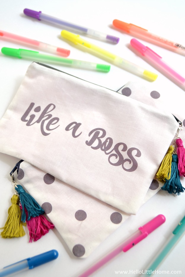 Learn how to make a cute "Like a Boss" DIY Zipper Pouch! This easy tutorial covers all the steps - from sewing the pouch to making the tassels - plus, learn how to create your own custom design! | Hello Little Home