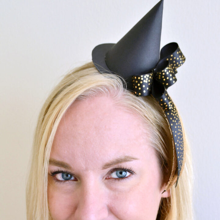 Closeup of a woman wearing the DIY Mini Witch Hat Headband.