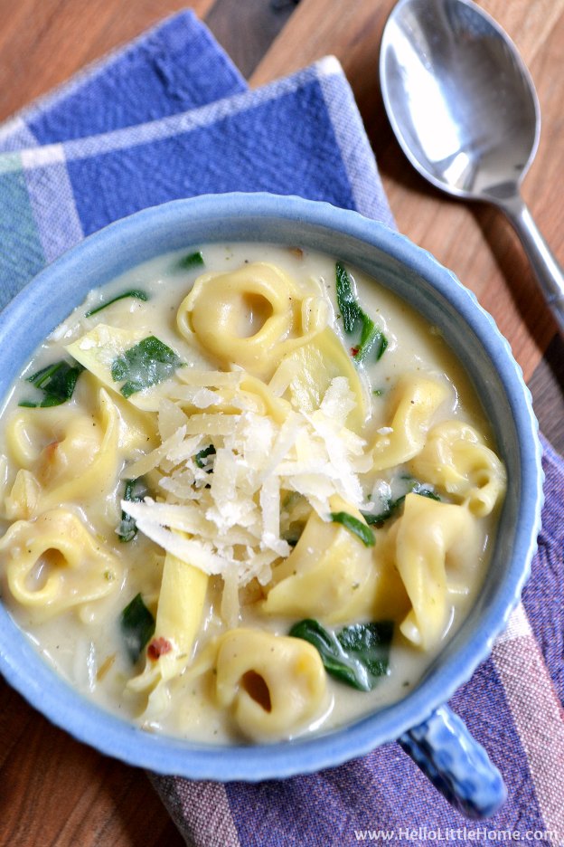 Creamy Spinach Artichoke Soup ... this rich vegetarian soup recipe is quick and easy to make and filled with veggies and yummy cheese tortellini! | Hello Little Home