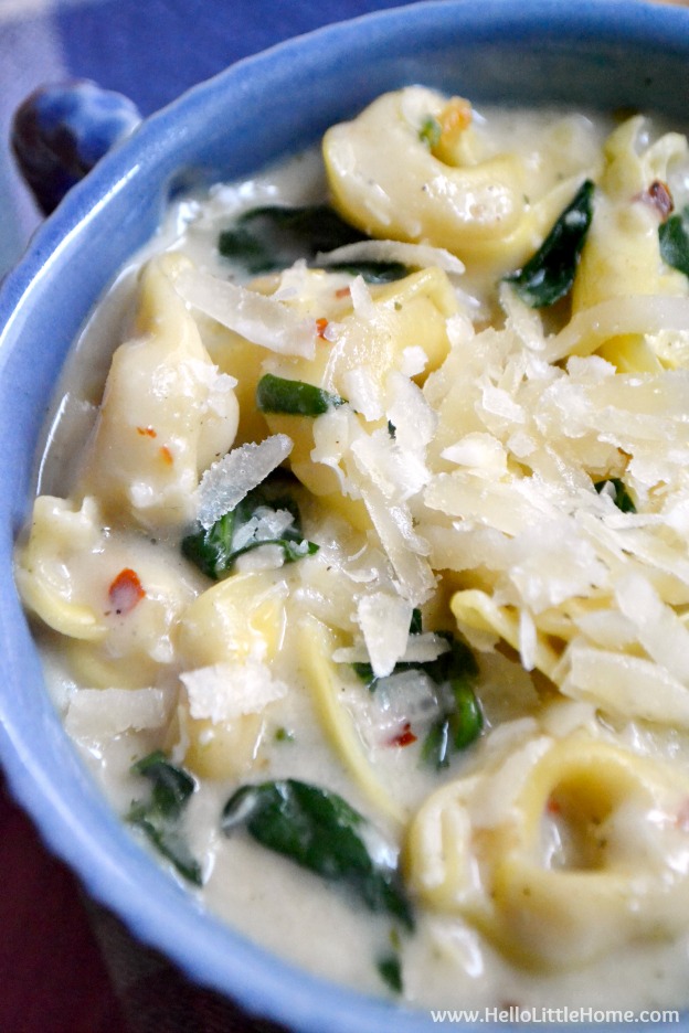 Creamy Spinach Artichoke Soup ... this rich vegetarian soup recipe is quick and easy to make and filled with veggies and yummy cheese tortellini! | Hello Little Home