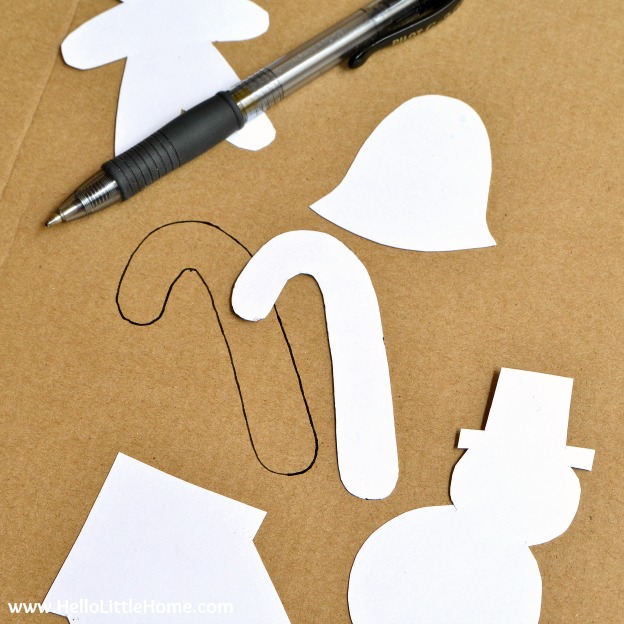 Tracing around the ornament template onto a piece of cardboard. | Hello Little Home
