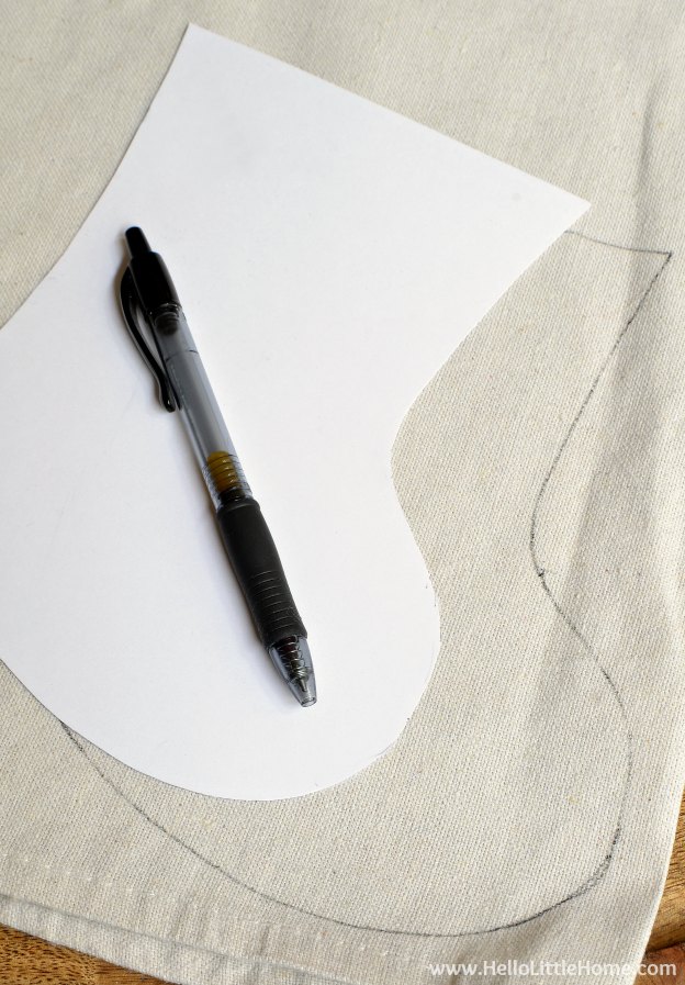 A pen and the pattern on a piece of fabric.