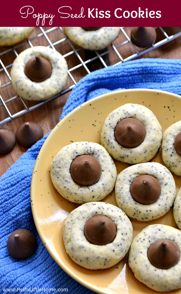 Poppy Seed Kiss Cookies recipe … an easy kiss cookie recipe that’s a family favorite! This delicious Hershey’s Kiss thumbprint cookie recipe is a simple Christmas cookie recipe you’re sure to love! This yummy chocolate Poppy Seed Cookies recipe makes a great holiday treat and is perfect for cookie exchanges. | Hello Little Home
