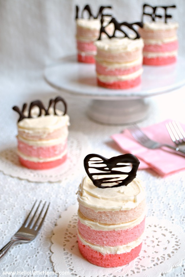 How to make Mini Ombre Cakes! This mini cake recipe is fun and easy to make, perfect for Valentine's Day! Customize the chocolate word cake toppers with any message you'd like! | Hello Little Home