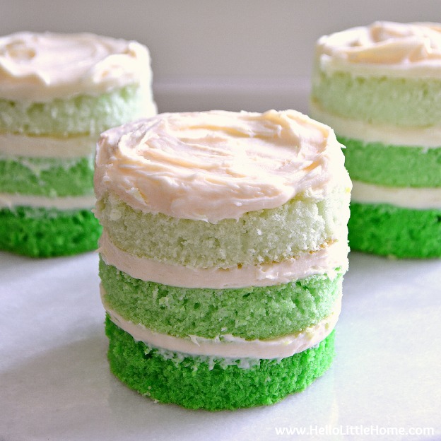 St. Patrick's Day Mini Ombre Cakes ... the perfect dessert recipe for St. Patty's Day! Easy step by step tutorial and recipe for making layered ombre cakes. A fun green St Patrick's Day recipe ... or customize the colors for any ocassion! | Hello Little Home