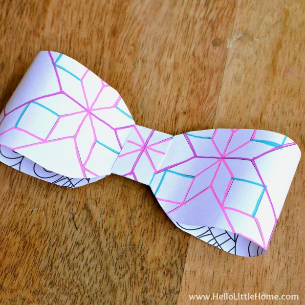 A DIY bow created from a coloring page.