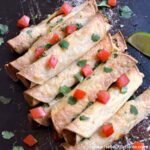 Baked Black Bean Taquitos with Avocado Cream Sauce ... yum! This delcious vegetarian taquitos recipe is made with corn tortillas filled with healthy, gluten free ingredients and packed with flavor. Serve them with salsa or an easy homemade avocado cream sauce (that's also perfect for tacos, enchiladas, etc.)! | Hello Little Home