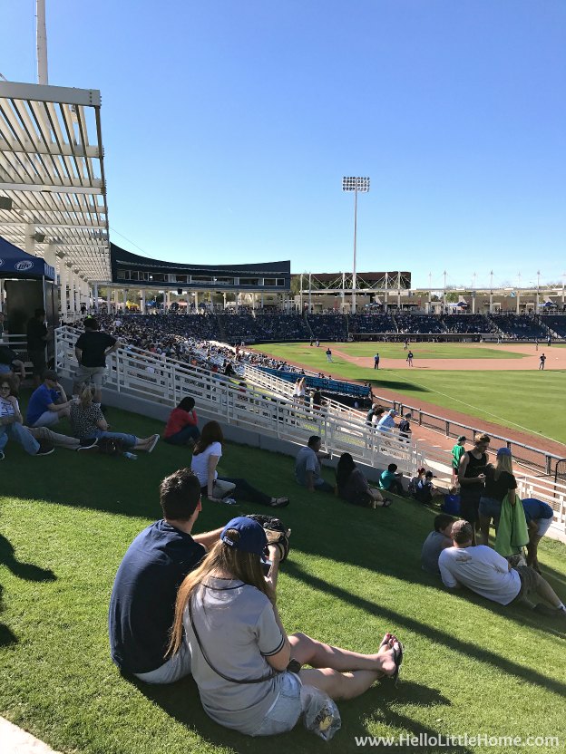 Cheering on the Milwaukee Brewers at Maryvale Baseball Park during an El Paso to Phoenix Road Trip! Travel from Texas to Arizona with lots of fun stops along the way, including White Sands National Monument and MLB spring training! Find out the best things to do in El Paso and Phoenix, from can't miss sights to delicious restaurants! | Hello Little Home