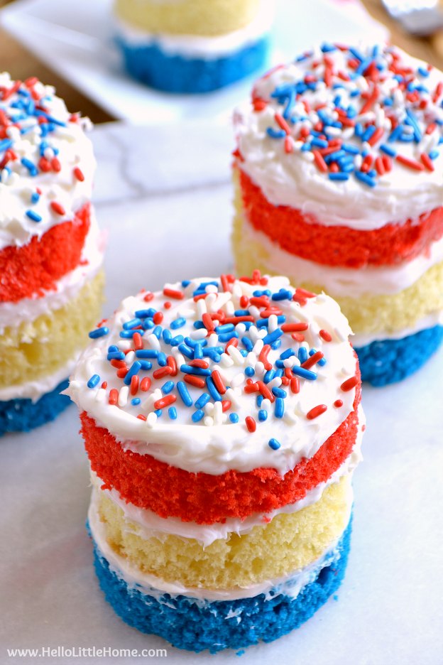 Red, White, and Blue Mini Cakes Recipe! Learn how to make these easy, homemade mini cakes! These red, white, and blue desserts are great for any patriotic party or BBQ this summer, like Fourth of July, Memorial Day, or Labor Day! These patriotic naked cakes are the perfect summer party idea! | Hello Little Home