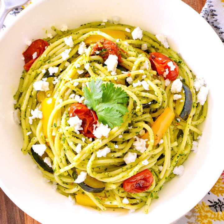 Cilantro Pesto Pasta served in a white bowl.