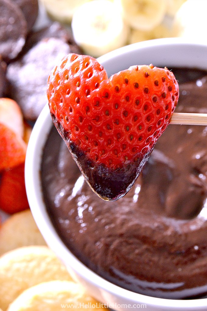 A strawberry dipped in dark chocolate.