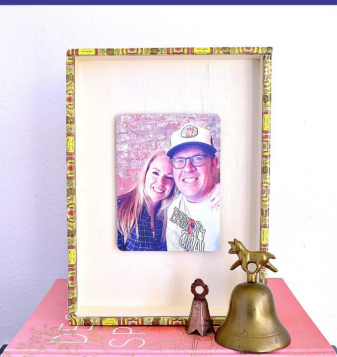 DIY Cigar Box Photo Frame tutorial! Looking for DIY photo frame ideas? Learn how to make a DIY picture frame from a repurposed cigar box. This easy cigar box craft is a simple vintage inspired wood frame for holding a fave photograph. A unique cigar box craft idea that's a creative gift for boyfriends, kids, friends, or moms or a home decor decoration you can hang on the wall. | Hello Little Home