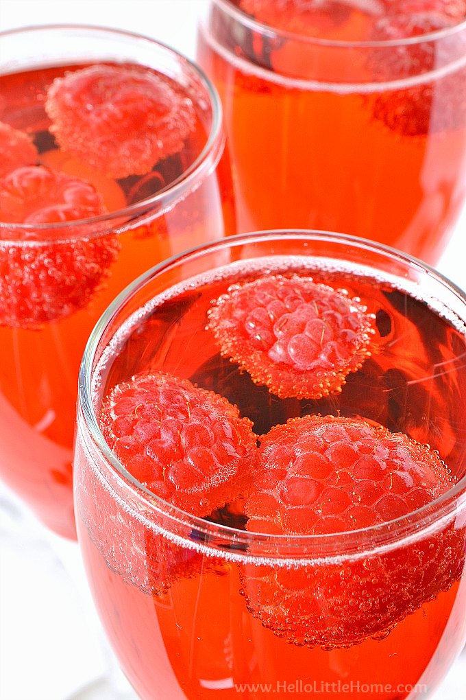 Closeup of raspberries floating in the finished drink.
