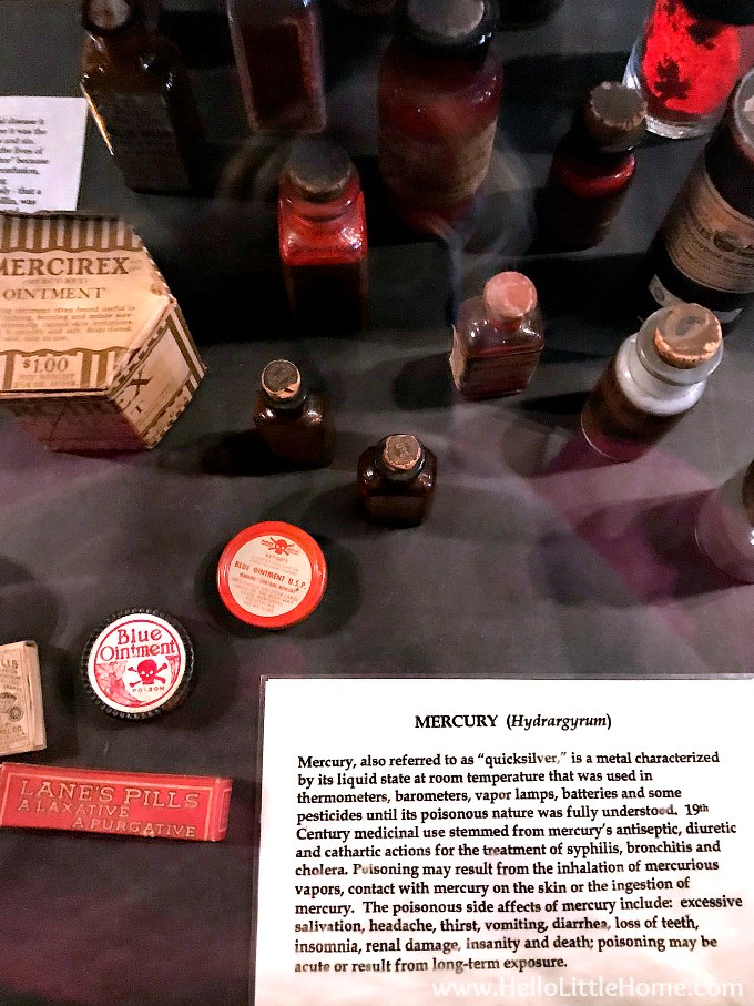 A cabinet filled ointments and mercury at the museum.