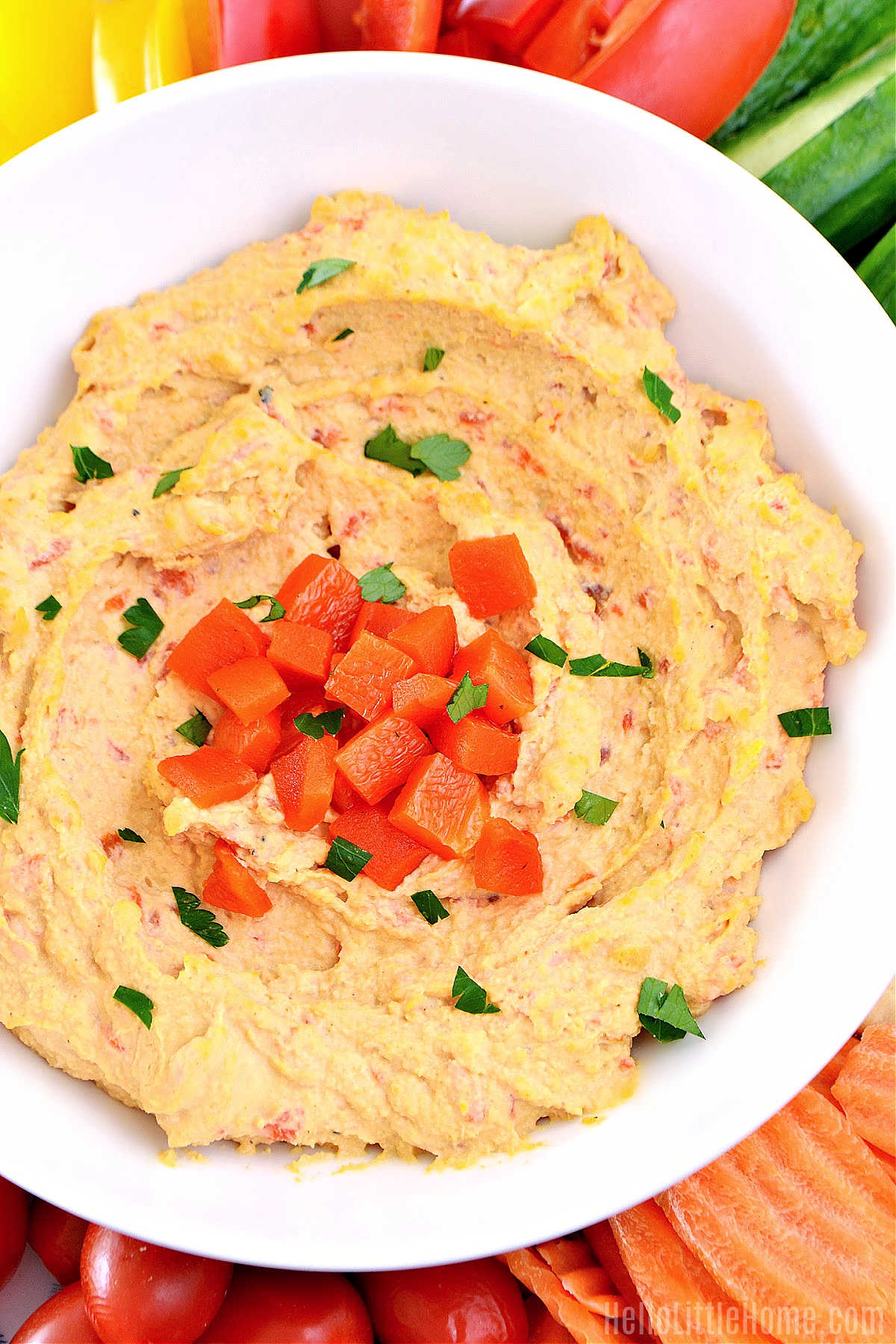 Closeup of a bowl of the bell pepper dip.