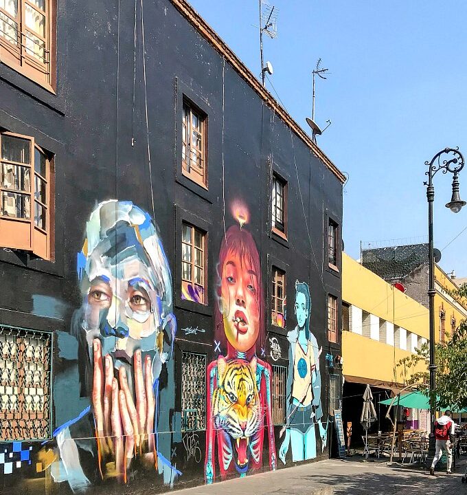 A huge, colorful mural on Calle Regina in Mexico City's Historic Center.