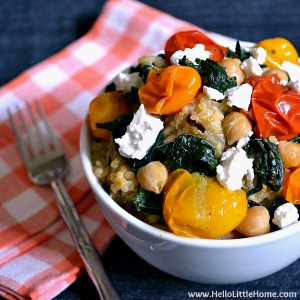 A bowl of Quinoa with Roasted Tomatoes, Kale, and Feta