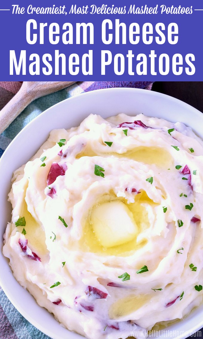 A bowl of mashed potatoes topped with butter.