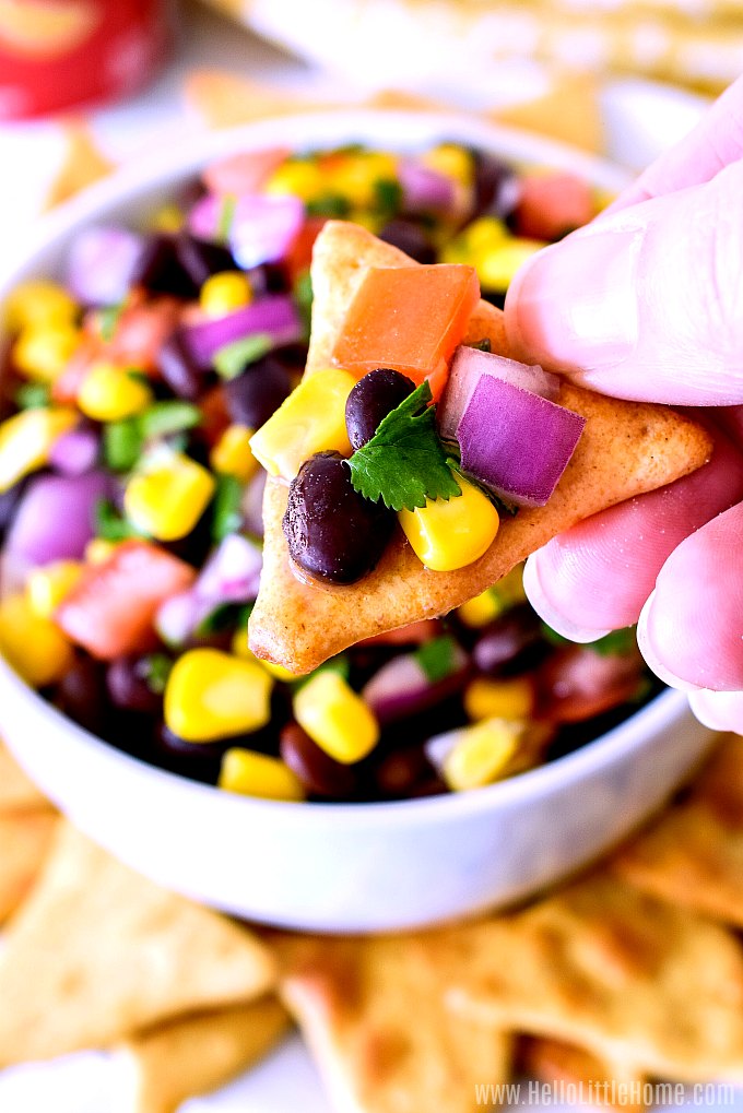Pita Chip topped with Black Bean Salsa.