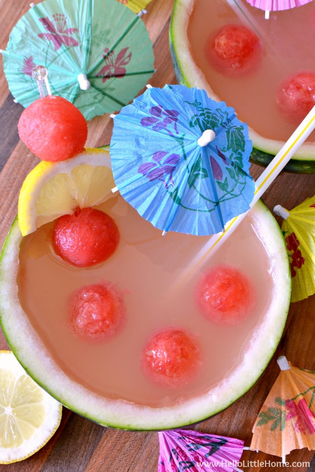 The finished drink garnished with a straw and paper umbrella.