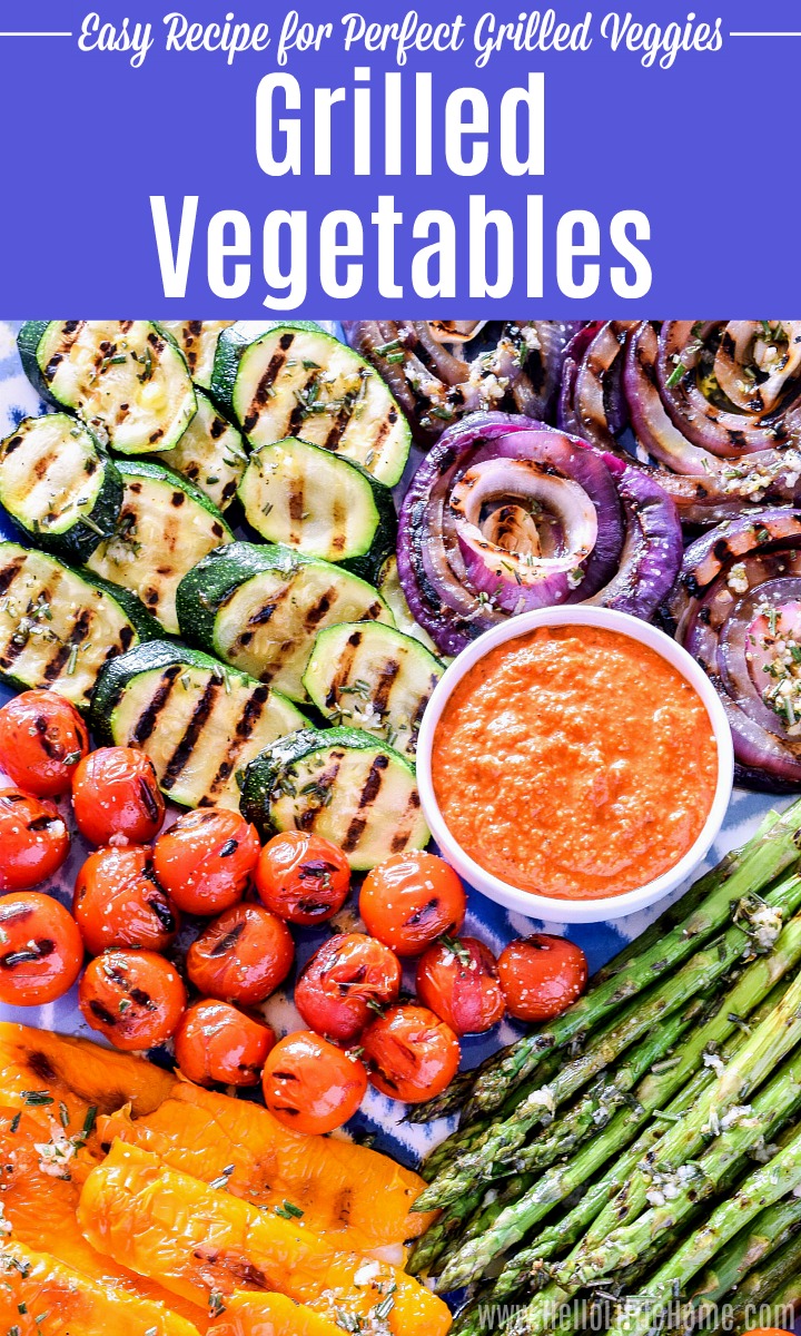 A platter of grilled vegetables: zucchini, onions, tomatoes, asparagus, peppers.