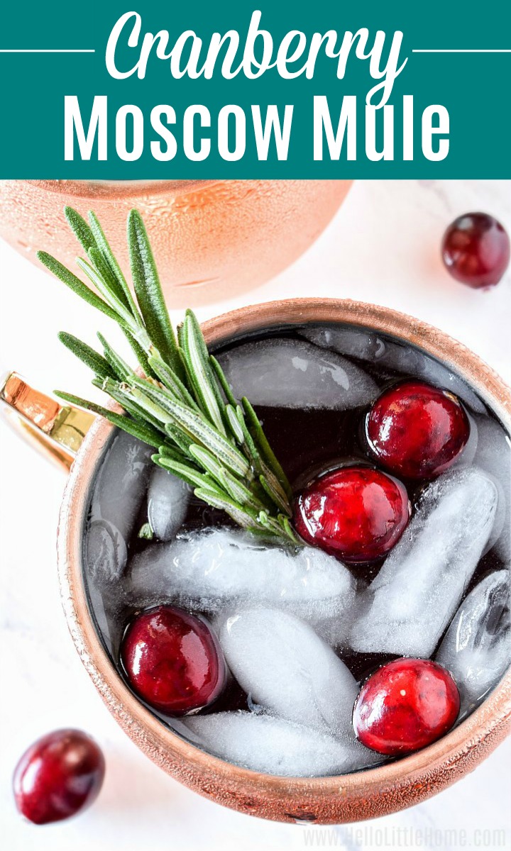 A Cranberry Moscow Mule garnished with fresh rosemary.
