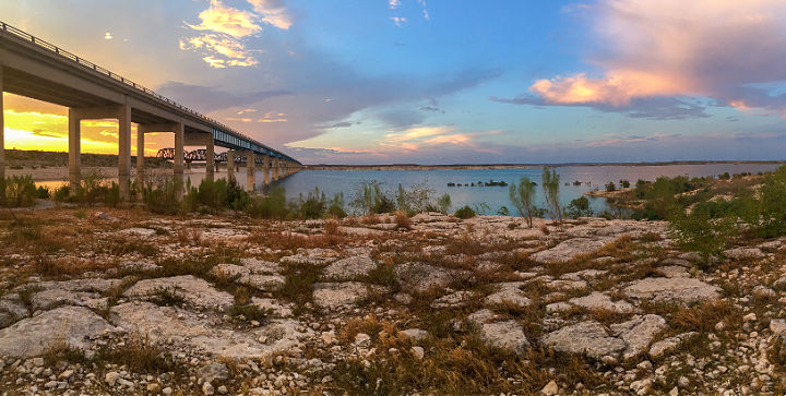 A colorful sunset over the reservoir in the Amistad National Recreation Area.