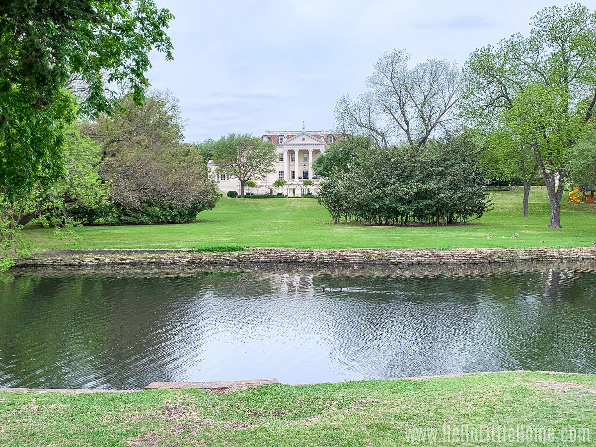 A mansion alongside Exall Lake in Lakeside Park in Dallas.