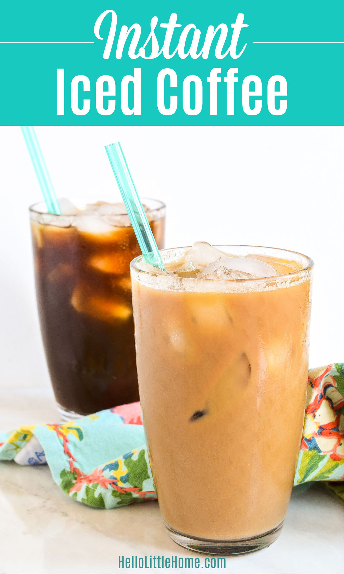 An iced latte made with instant coffee in front of a black iced coffee on a marble counter.