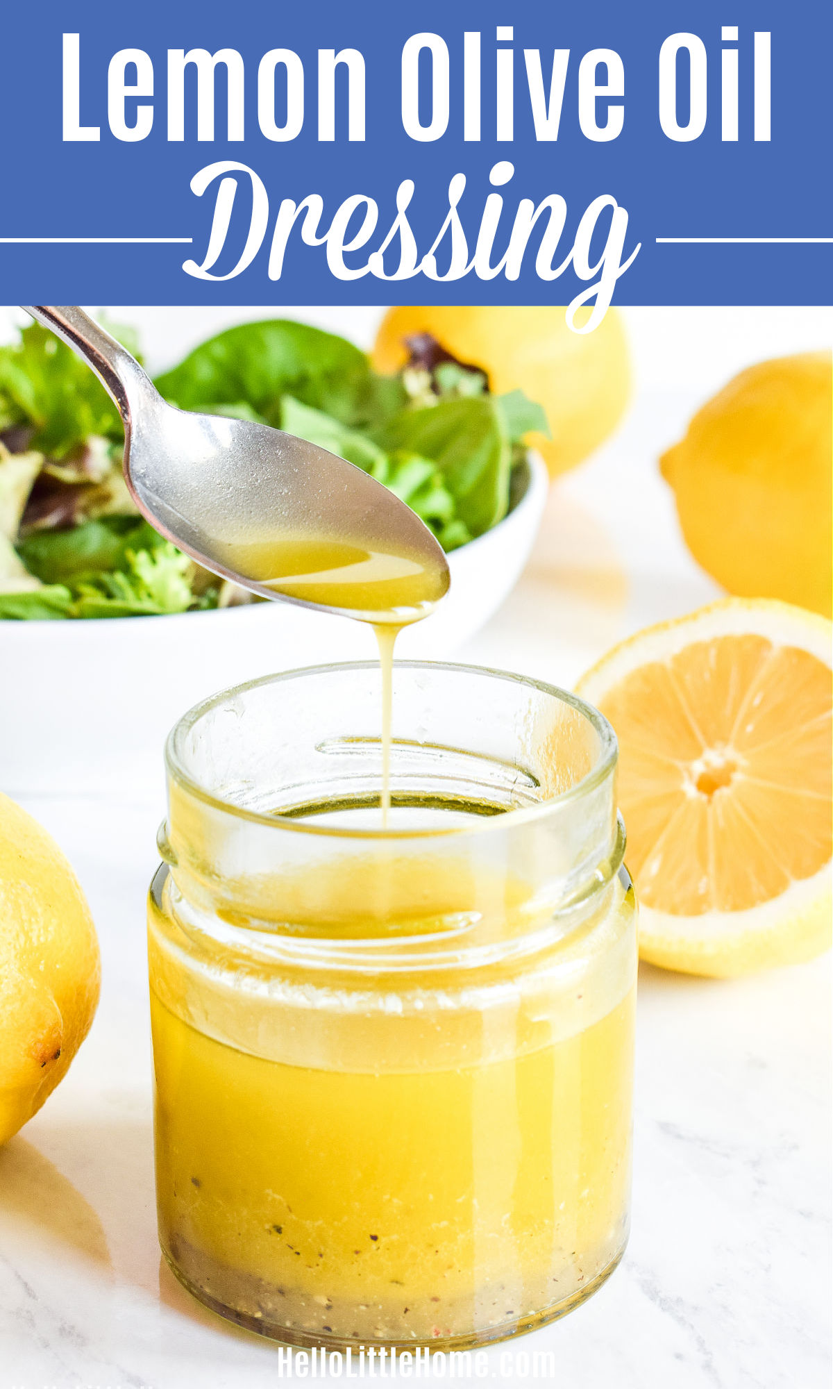A spoon drizzling Lemon Olive Oil Dressing into a jar.