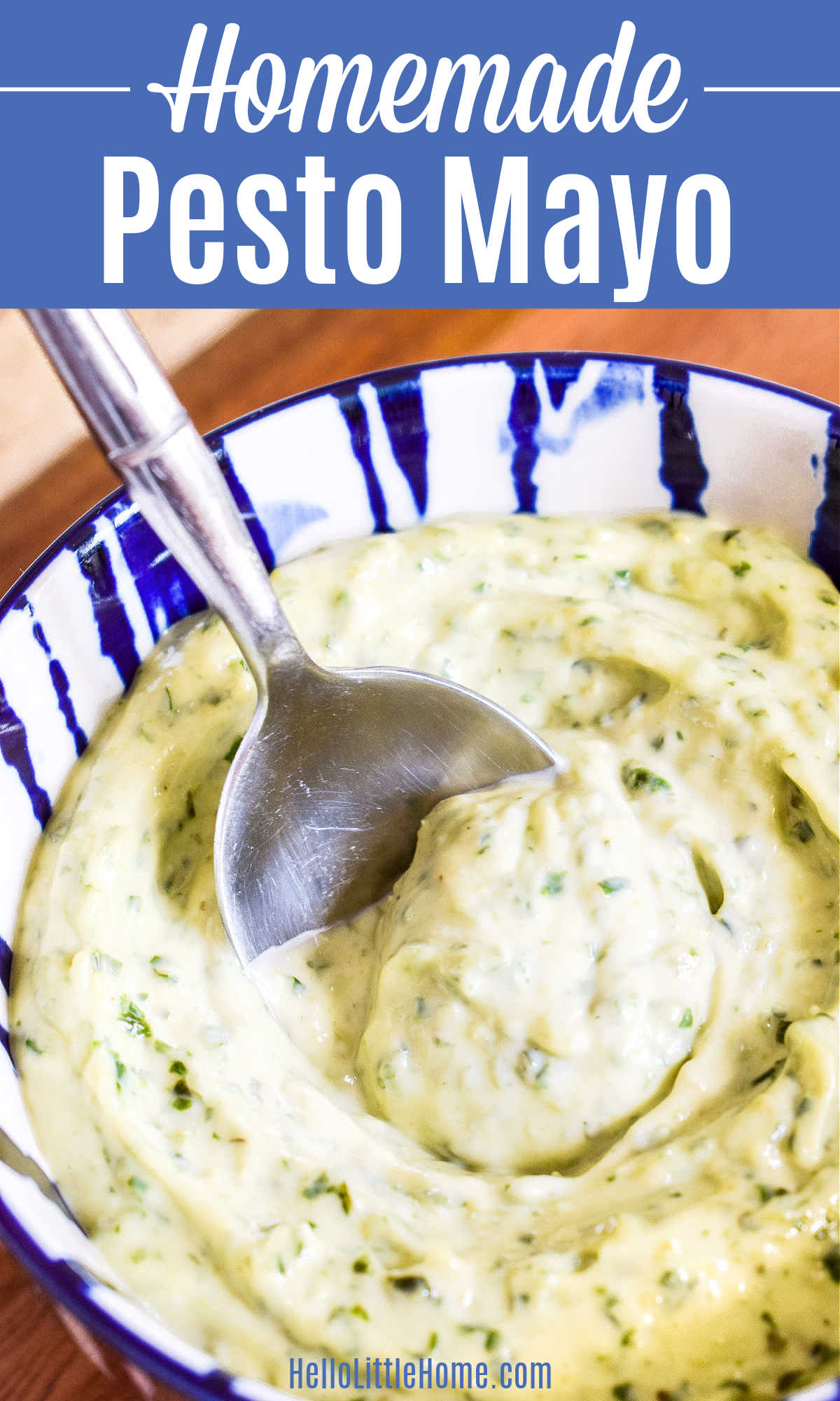 A spoon in a bowl of Pesto Mayo.