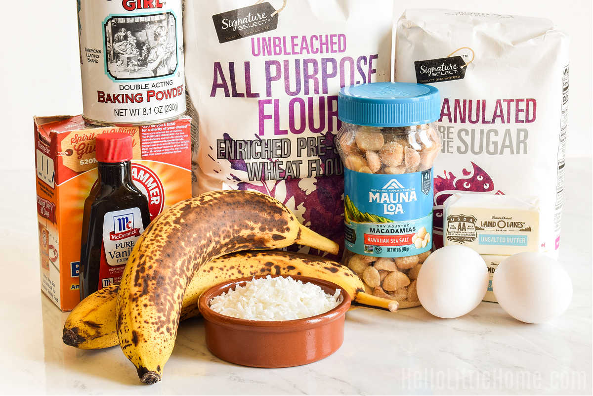 Banana Coconut Bread ingredients arranged together on a marble counter.